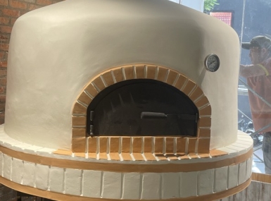 Tại sao nên chọn xây lò nướng pizza bằng gạch?